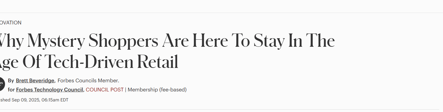 A retail manager and a T-ROC representative in black polo shirts review product assembly data on a tablet while standing in a store aisle, discussing how to choose a product assembly company