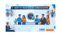A clean, horizontal blog banner with a modern light blue and orange tech-retail theme. In the center, a gear icon encloses the T-ROC logo alongside a blue security shield checkmark, representing structured training and brand alignment. On either side, diverse brand ambassadors in T-ROC uniforms are shown collaborating, using tablets, and learning in a retail environment. The top header prominently displays 